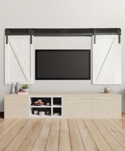 Barn door shutters around a tv
